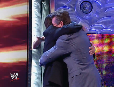 Resultado de imagem para eric bischoff vince mcmahon hug