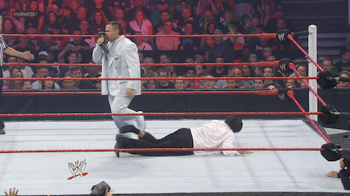 Santino Marella sniffs Ricardo Rodríguez's shoe during their tuxedo match