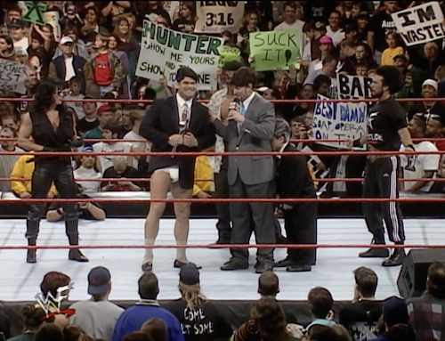 D-Generation X, imitating the Corporation, stands in the ring. Billy Gunn wears a diaper.