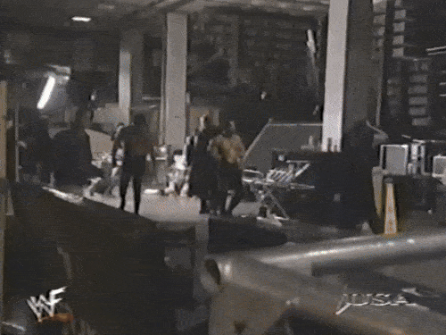 At WWF Raw, the Acolytes, Mideon, Viscera, and some agents walk away from backstage segment. The camera then pans past some junk to The Undertaker, sitting on his throne