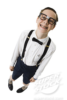 Male nerd with suspenders and tape on eyeglasses smiling with braces