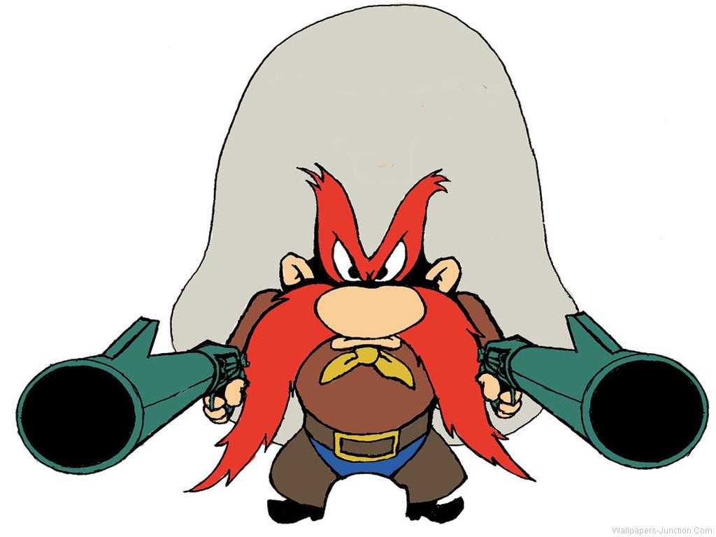 Yosemite Sam holding two big guns