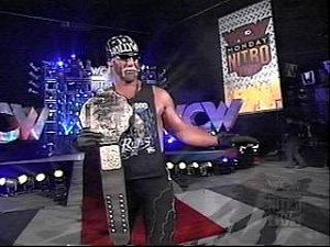 Hulk Hogan holding WCW NWO spray paint belt