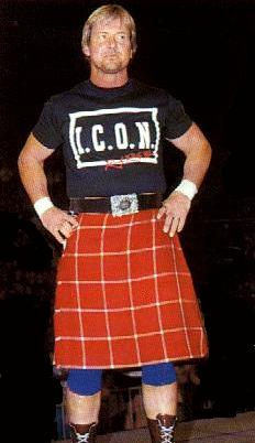 Roddy PIper wearing I.C.O.N ICON shirt