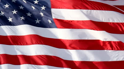 stock-footage-american-flag-slow-waving-close-up-of-american-flag-waving-filmed-at-fps-and-slowed-down-to