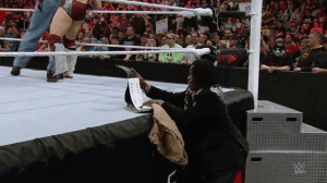 …who lost track of the belt during a brawl, allowing R-Truth to sneak away with it again in a burlap bag.